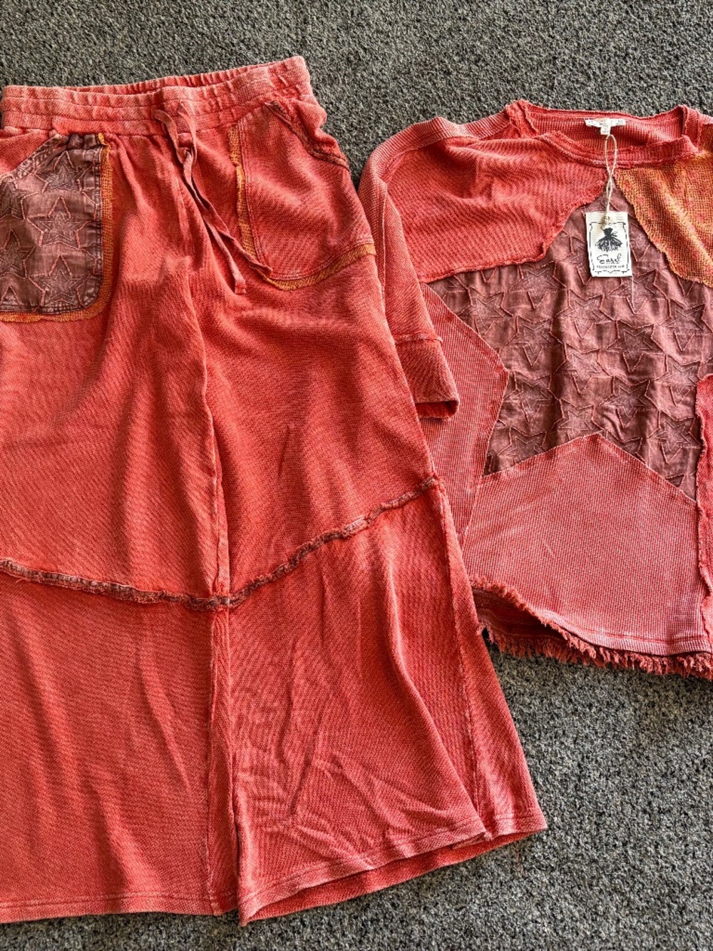 Easel orange star too and pants medium